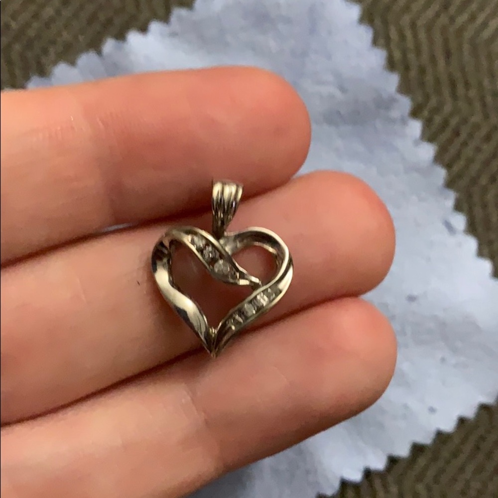 Real diamond and white gold pendant